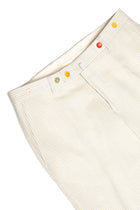 Cream casual shorts with blue stripes