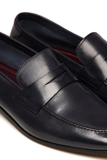 Navy leathered moccasins