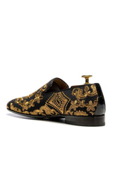 Black shoes with golden embroidery
