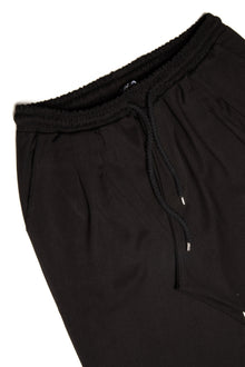 Black trousers with cord