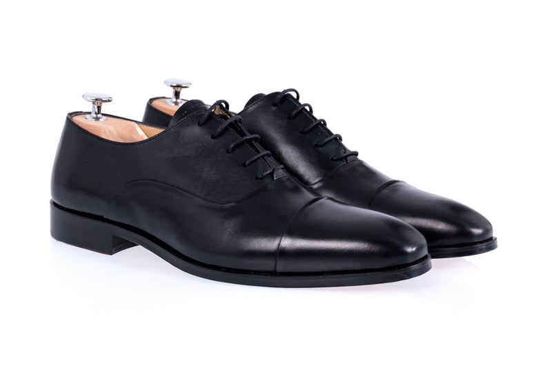 Black leather Oxford shoes