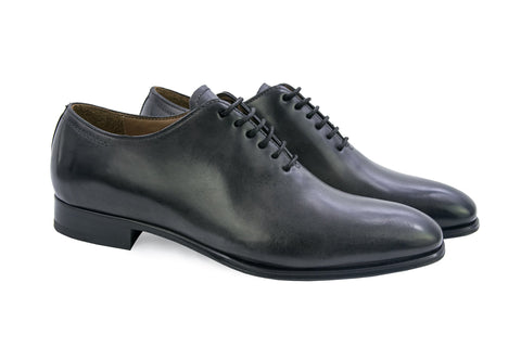 Black leather Oxford shoes