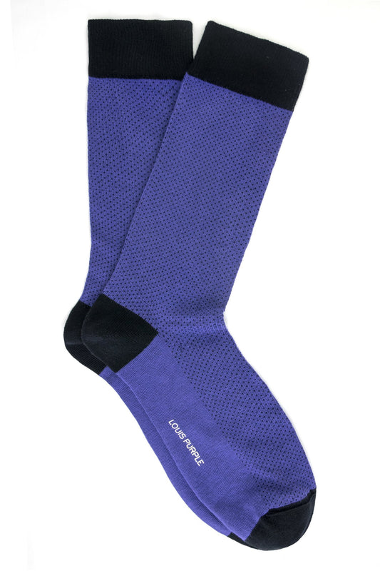 Purple socks with black dots